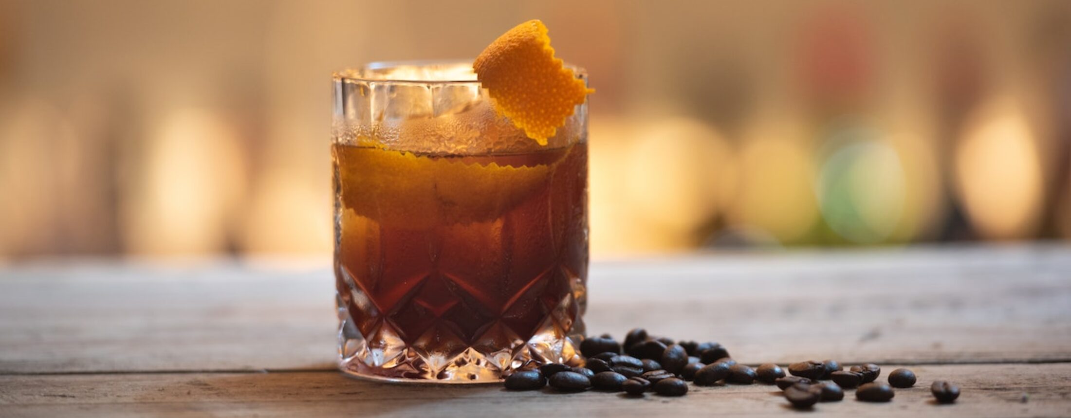 Old fashion cocktail drink with coffee beans
