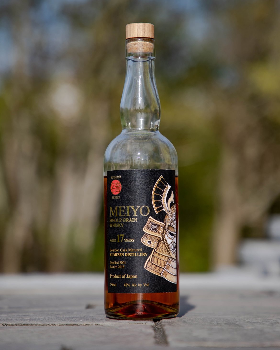 A bottle of Japanese whisky called Kumesen Meiyo 17-Year Old Single Grain