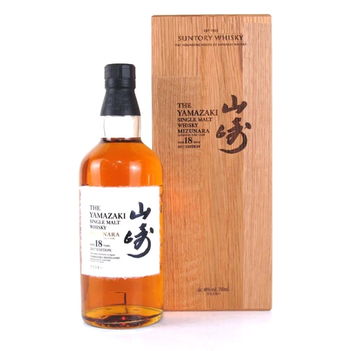 A bottle of whisky called Yamazaki Mizunara Cask 2017 Edition with a box